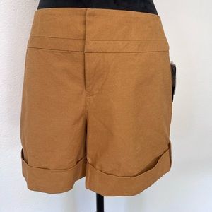 NWT Nicole Miller Shorts. Gold Color Size 8.